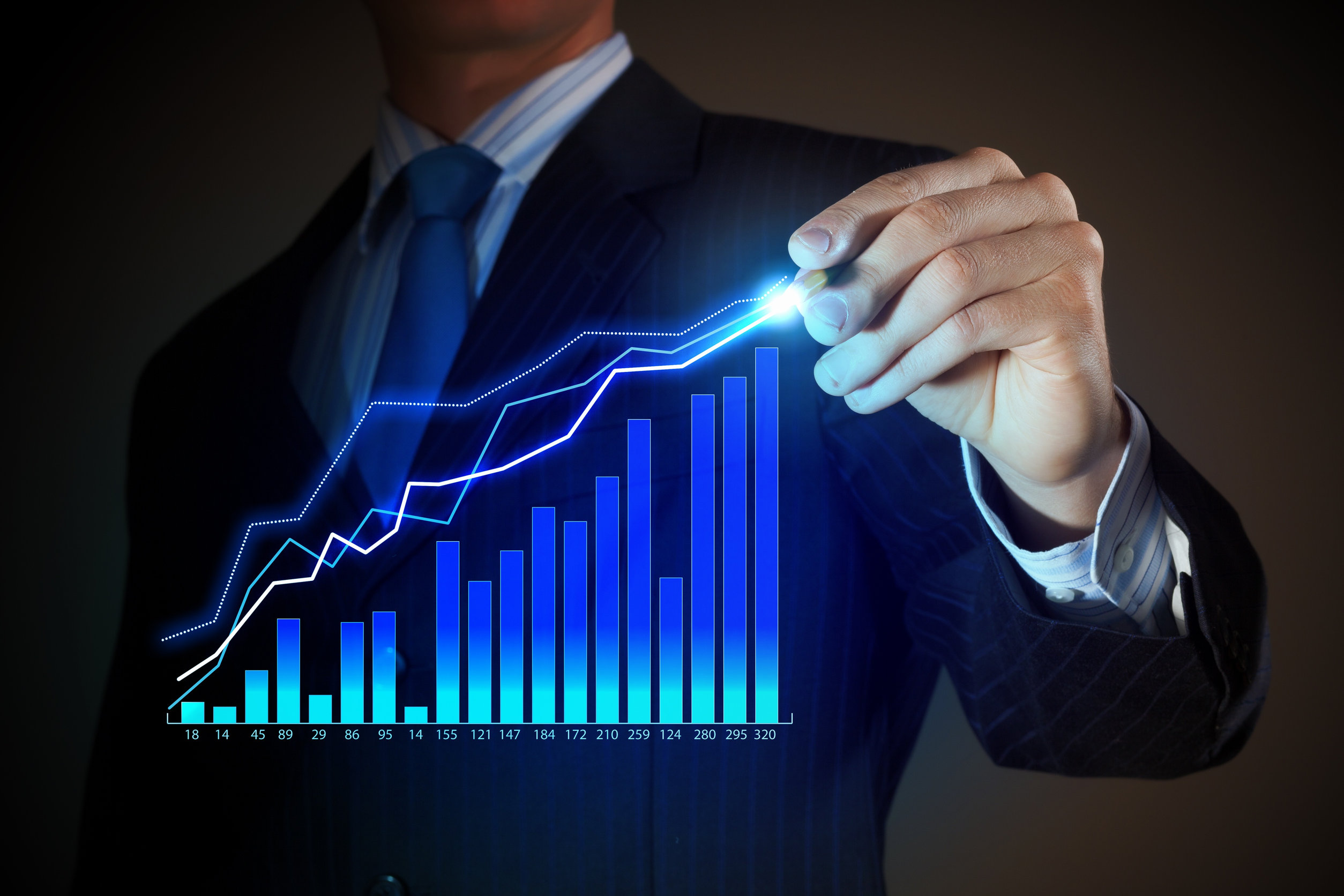 Closeup image of businessman drawing 3d graphics